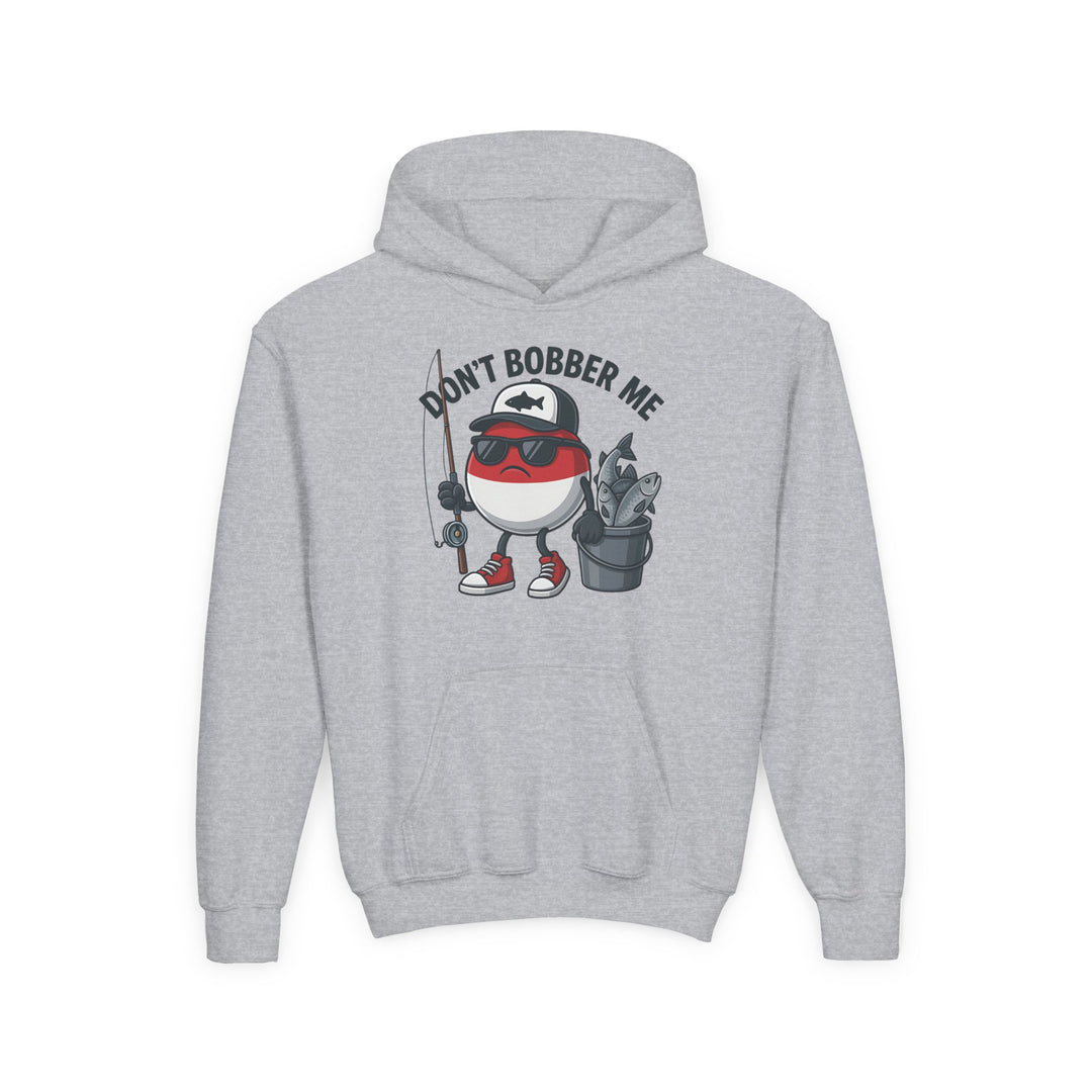 Don't Bobber Me Youth Hoodie featuring a fun graphic of a fishing bobber character with sunglasses and fishing gear. Ultra-soft, preshrunk fleece with kangaroo pocket.