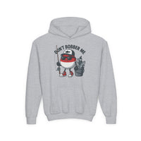 Don't Bobber Me Youth Hoodie featuring a fun graphic of a fishing bobber character with sunglasses and fishing gear. Ultra-soft, preshrunk fleece with kangaroo pocket.
