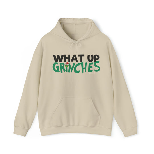 Unisex What up Grinches Hoodie, white with green and black text. Heavy blend of cotton and polyester, kangaroo pocket, drawstring hood. Classic fit, tear-away label, medium-heavy fabric.