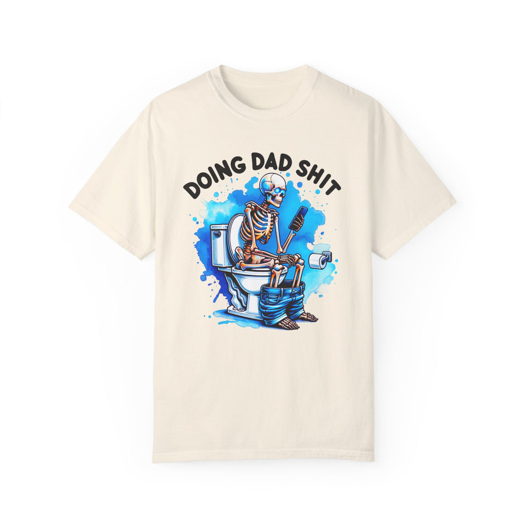 A white tee featuring a skeleton on the toilet, part of the Doing Dad Shit Tee collection at Worlds Worst Tees. Made of 100% ring-spun cotton, garment-dyed for extra coziness and durability.