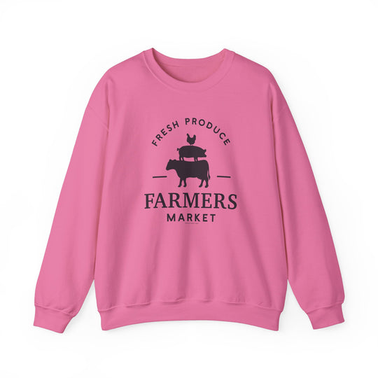 A pink sweatshirt featuring a logo of a chicken and pig, ideal for comfort in any situation. Unisex heavy blend crewneck with ribbed knit collar, 50% Cotton 50% Polyester, loose fit, and no itchy side seams. From 'Worlds Worst Tees'.