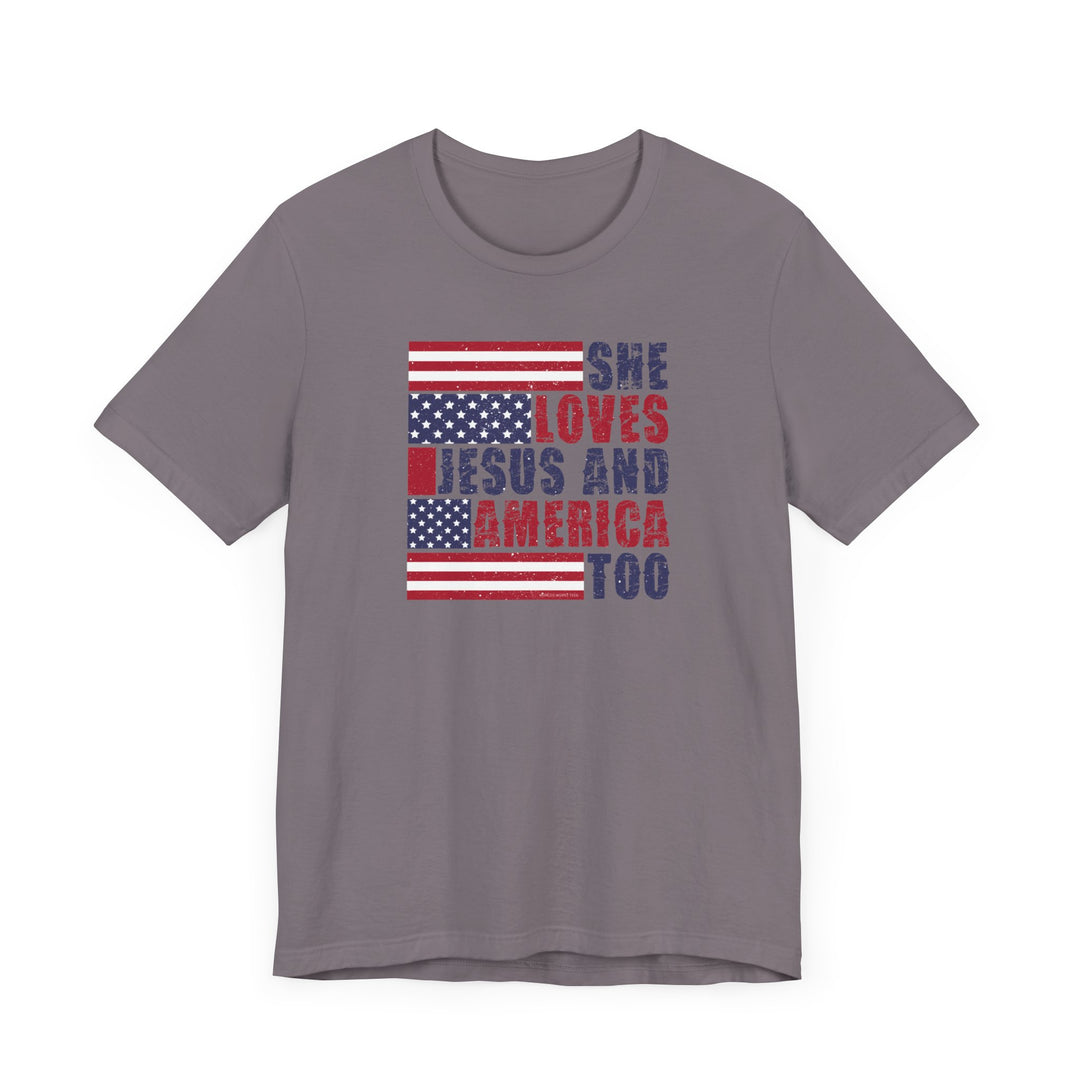 A unisex jersey tee featuring She Loves Jesus and America text. Made of 100% cotton, light fabric, ribbed knit collars, and tear-away label. Retail fit with dual side seams for shape retention.