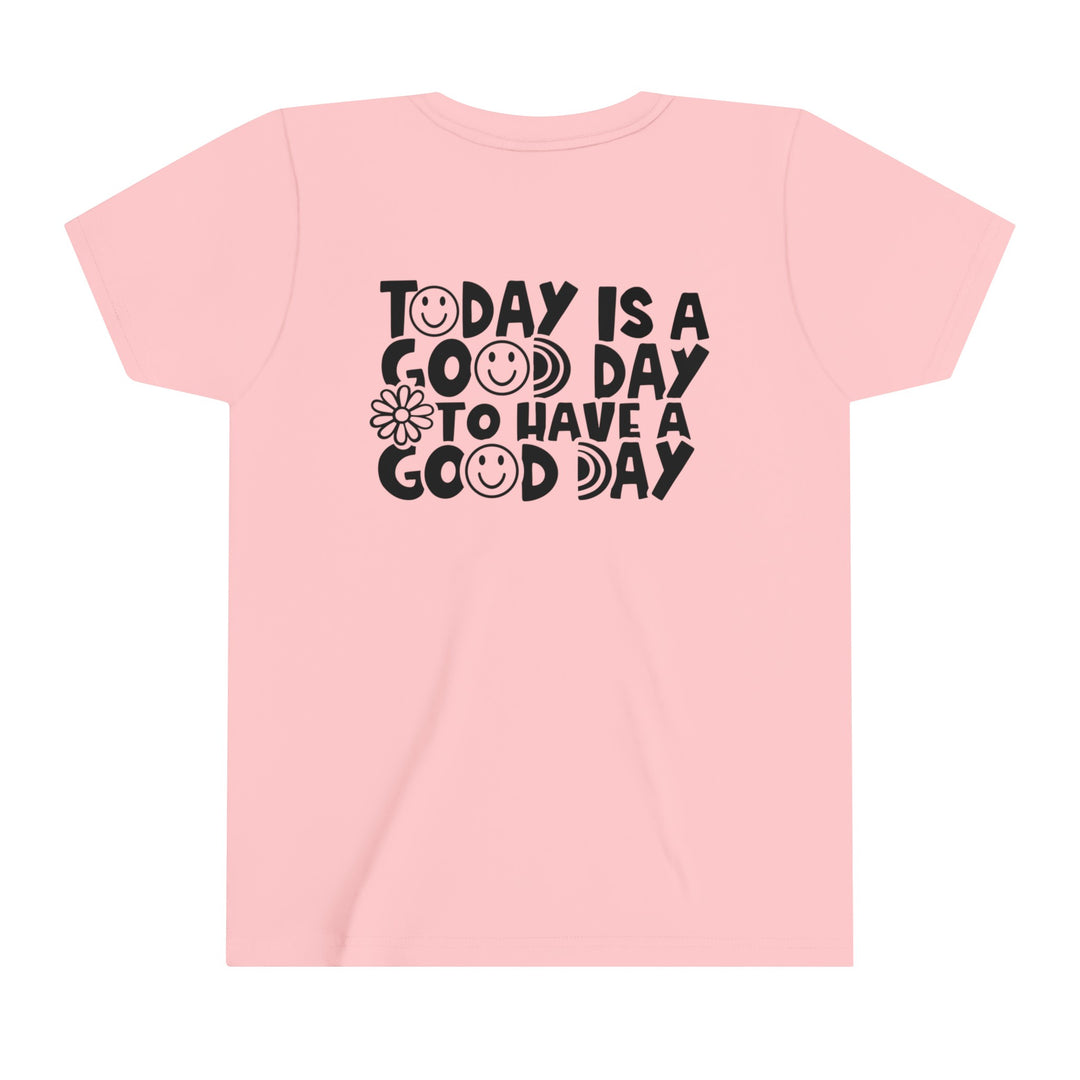 Youth short sleeve tee with Good Day to Have a Good Day text. Pink shirt with black text, smiley faces, and flower design. Lightweight, 100% cotton, tear-away label, retail fit. Sizes: S, M, L, XL.