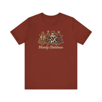 Rust-red Howdy Christmas Tee featuring Western-themed trees with unique patterns and cowboy accents, crafted from soft cotton for a comfortable, lasting fit.