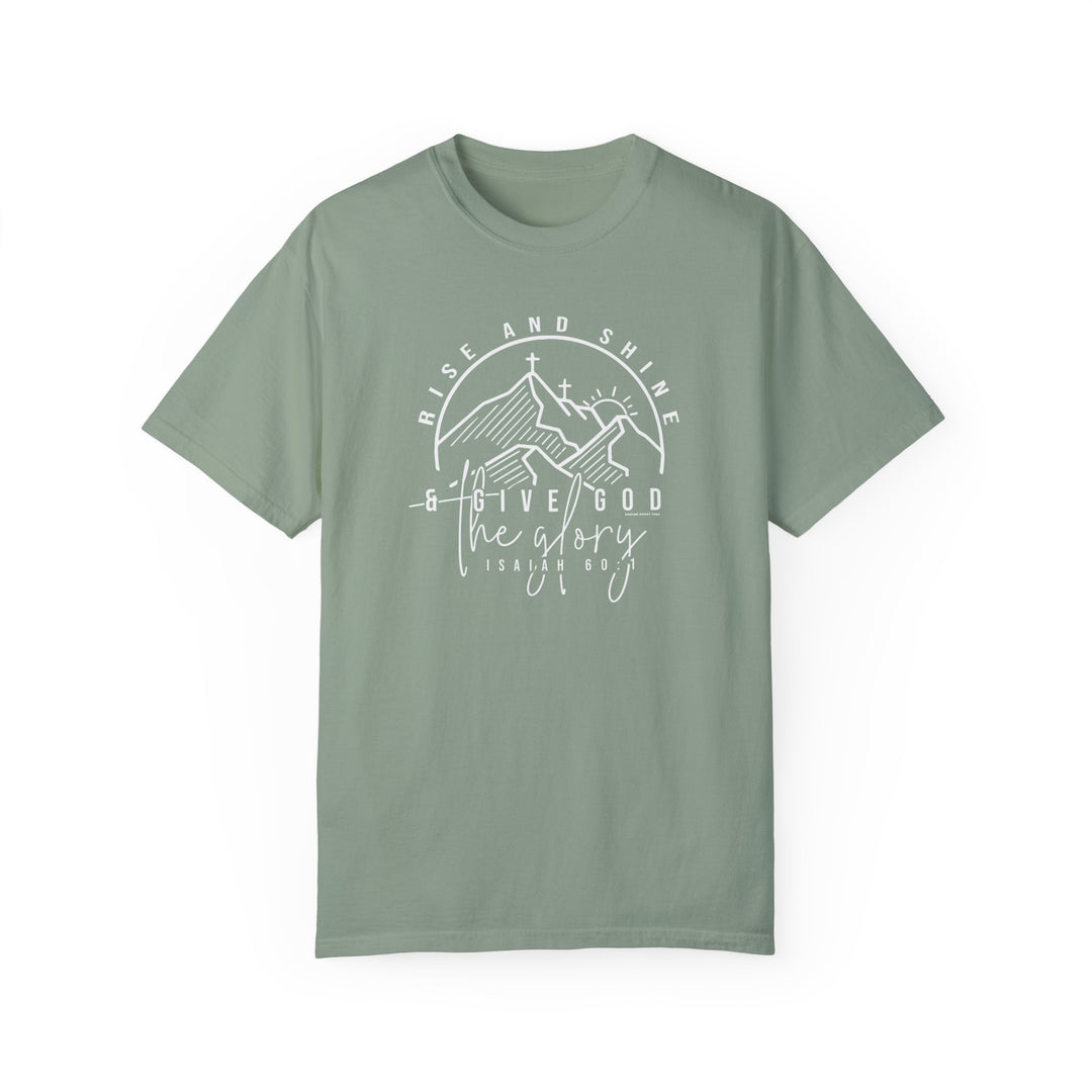 A green Rise and Shine Tee, crafted from 100% ring-spun cotton. Garment-dyed for extra coziness, with a relaxed fit and durable double-needle stitching. Ideal for daily wear.