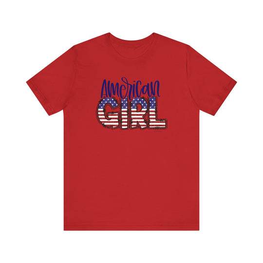 American Girl Tee: Red shirt with flag and text designs. Unisex jersey tee with ribbed knit collar, 100% cotton, retail fit, tear away label. Sizes XS-3XL. Soft, quality fabric for a loved favorite.