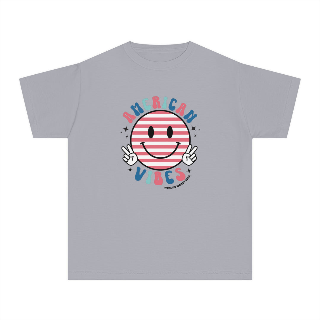 American Vibes Youth Tee: A grey t-shirt featuring a smiley face design, perfect for active kids. 100% combed ringspun cotton, soft-washed, and garment-dyed for comfort. Classic fit for all-day wear.