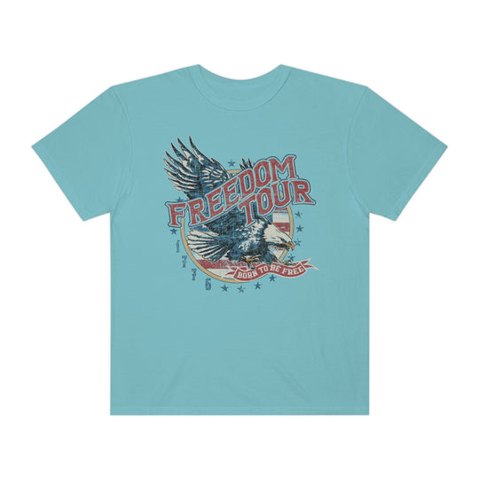 Blue Freedom Tour Tee, a garment-dyed shirt in ring-spun cotton. Soft-washed for coziness, with a relaxed fit and durable double-needle stitching. No side-seams for a tubular shape.