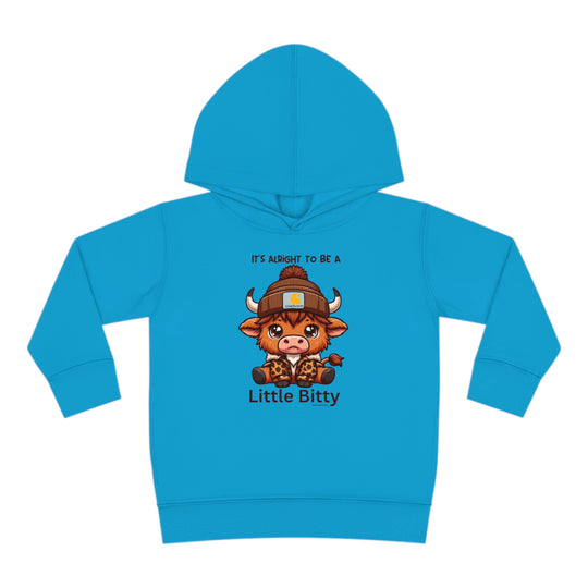 Little Bitty Toddler Hoodie featuring a cartoon cow design, ideal for cozy days. Jersey-lined hood, cover-stitched details, and side seam pockets for durability and comfort. From Worlds Worst Tees.