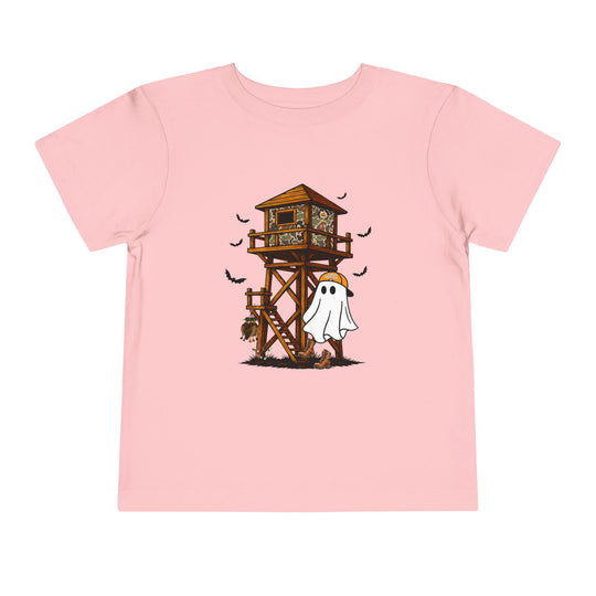 Ghost Hunter Toddler Tee featuring a cartoon ghost in a hunting cap, bats, and deer skull, all on a light-pink background. Perfect for a playful, spooky look.