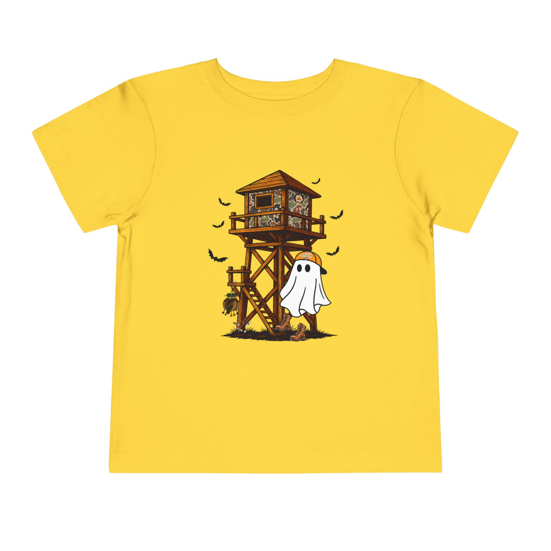 Ghost Hunter Toddler Tee features a playful Halloween design with a ghost in a hunting camp scene, perfect for adding fun to any child's wardrobe.