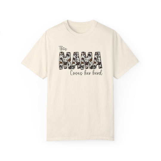 A white Mama Herd Tee, 100% ring-spun cotton, garment-dyed. Soft-washed, relaxed fit with double-needle stitching for durability and tubular shape. Medium weight, no side-seams.