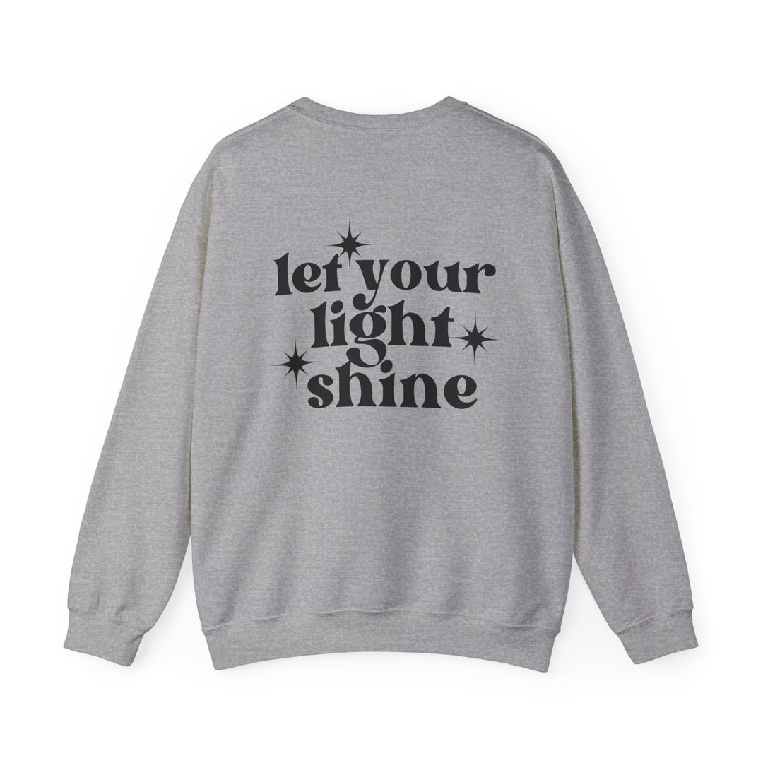 A unisex heavy blend crewneck sweatshirt featuring Let Your Light Shine Crew design. Ribbed knit collar, no itchy side seams. 50% Cotton 50% Polyester, medium-heavy fabric, loose fit. Ideal comfort for any occasion.