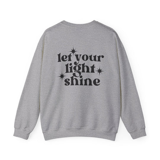 A unisex heavy blend crewneck sweatshirt featuring Let Your Light Shine Crew design. Ribbed knit collar, no itchy side seams. 50% Cotton 50% Polyester, medium-heavy fabric, loose fit. Ideal comfort for any occasion.