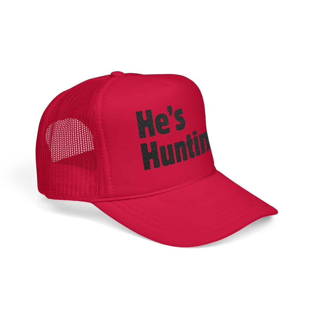 Bright red foam trucker hat with He's Huntin. text, mesh back, adjustable fit, seamless front, and pre-curved visor for custom embroidery.