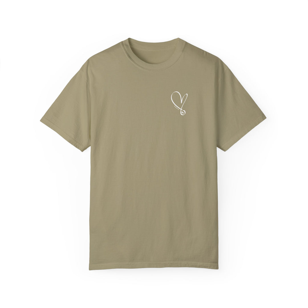 A tan t-shirt featuring a heart design, the I am Beautiful Tee by Worlds Worst Tees. Made of 100% ring-spun cotton, garment-dyed for extra coziness, with a relaxed fit and durable double-needle stitching.
