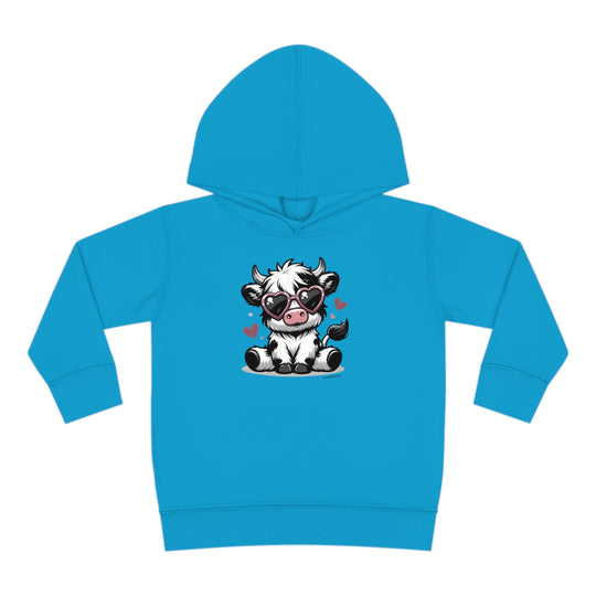 Toddler hoodie featuring a cartoon cow wearing sunglasses. Jersey-lined hood, cover-stitched details, and side seam pockets for durability and coziness. Cute Cow Toddler Hoodie by Worlds Worst Tees.