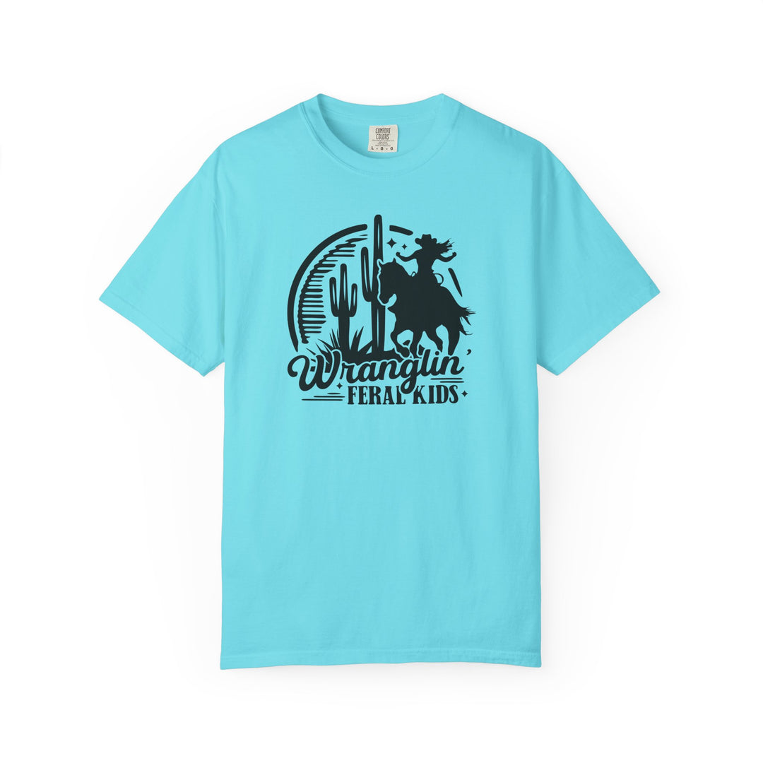Wranglin' Feral Kids Tee featuring a western-style black graphic of a child on horseback with cacti and a sun, on a soft Comfort Colors t-shirt.