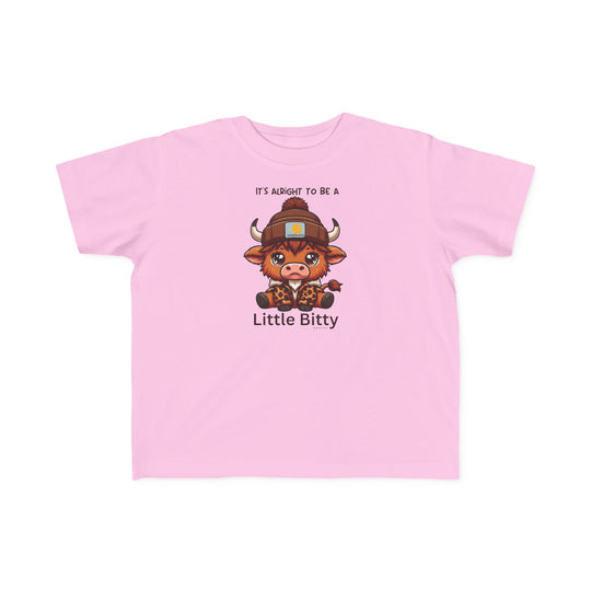 Little Bitty Toddler Tee featuring a cartoon cow design on pink fabric. 100% combed ringspun cotton, light fabric, tear-away label, classic fit. Available in sizes 2T to 5-6T.