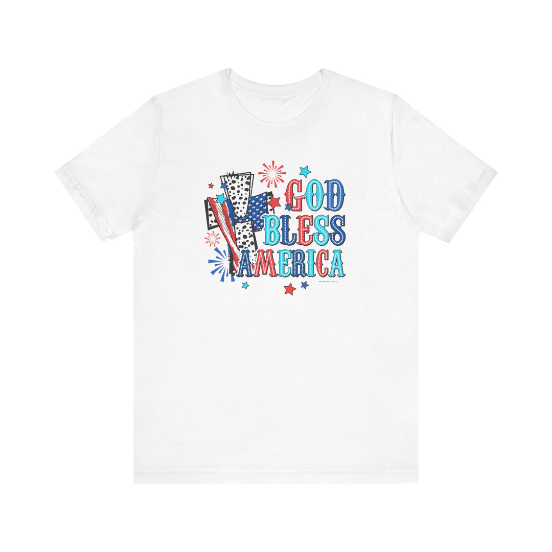 A classic white tee featuring red, white, and blue text with a cross and fireworks design. Made of 100% Airlume combed cotton, retail fit, tear away label, and ribbed knit collars for a comfortable fit.