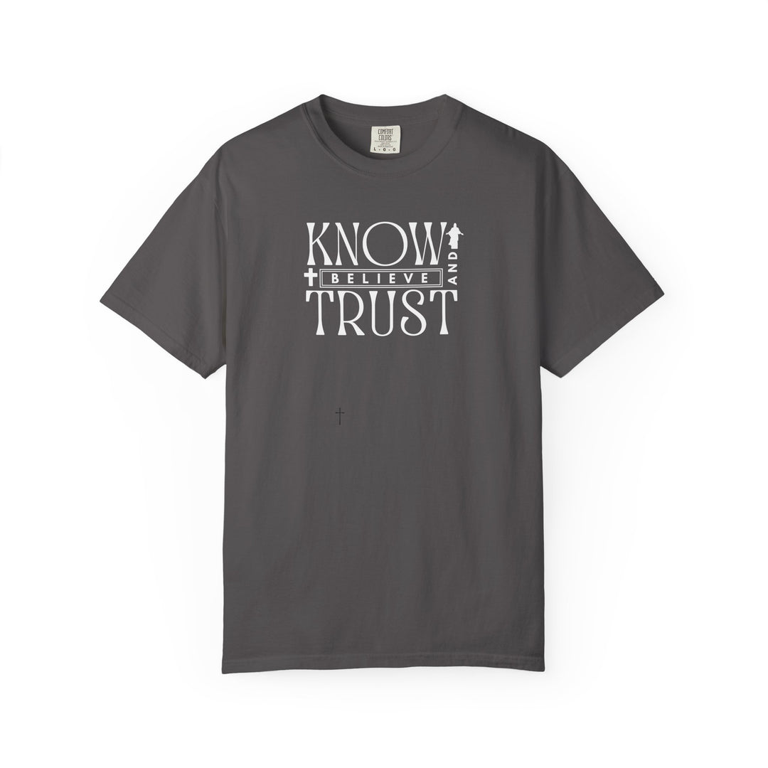 Know, Trust, Believe Tee by Comfort Colors: A grey t-shirt with white text, made from soft-washed, garment-dyed 100% ring-spun cotton, offering a relaxed fit.