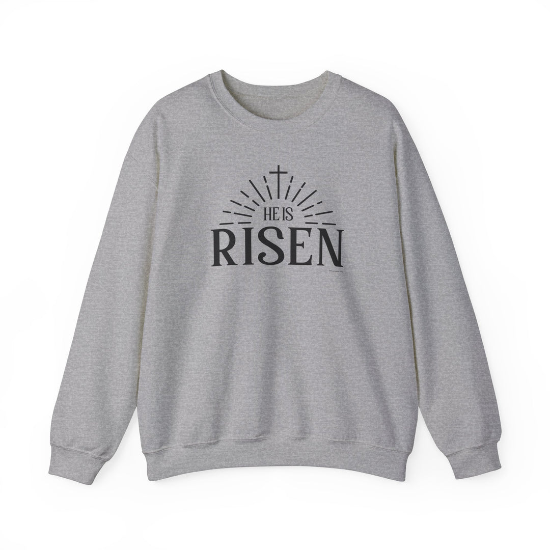 A unisex heavy blend crewneck sweatshirt featuring the He is Risen Crew design. Made from 50% cotton and 50% polyester, with ribbed knit collar for shape retention and double-needle stitching for durability.