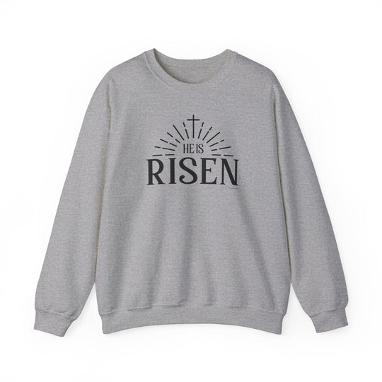 A unisex heavy blend crewneck sweatshirt featuring the He is Risen Crew design. Made from 50% cotton and 50% polyester, with ribbed knit collar for shape retention and double-needle stitching for durability.