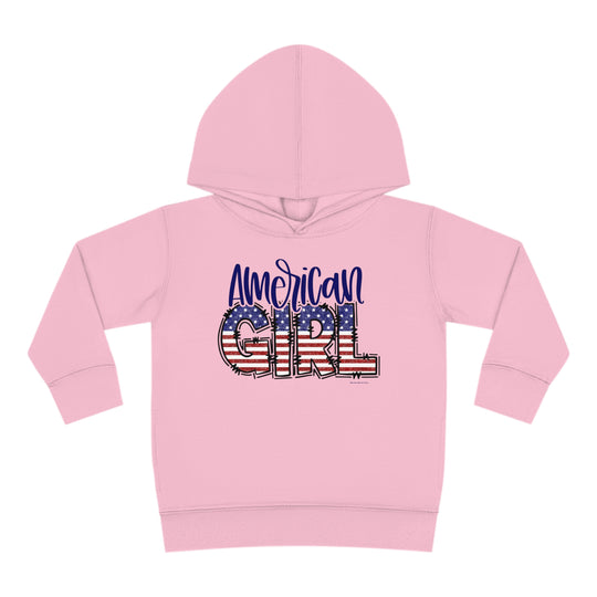 American Girl Toddler Hoodie with flag and words graphic, jersey-lined hood, cover-stitched details, and side seam pockets for durable coziness. Ideal for active kids.