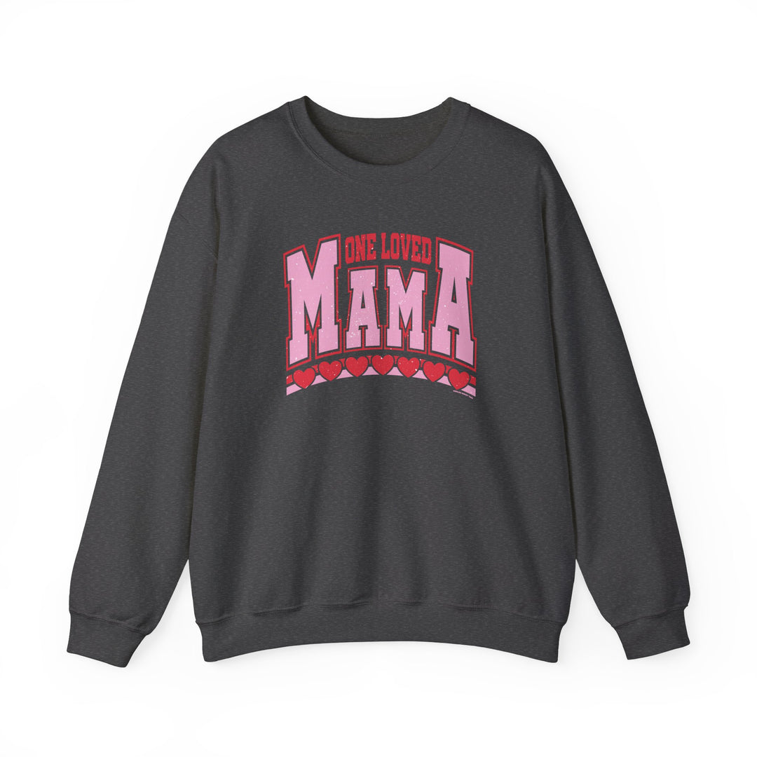 A unisex heavy blend crewneck sweatshirt featuring a heart design and One Loved Mama Crew graphic. Made of 50% cotton and 50% polyester, with ribbed knit collar and no itchy side seams.