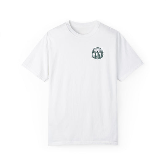 A white t-shirt featuring a logo with a deer and trees, the Raise Um Right Tee by Worlds Worst Tees. Made of 100% ring-spun cotton, garment-dyed for coziness, with a relaxed fit and durable double-needle stitching.