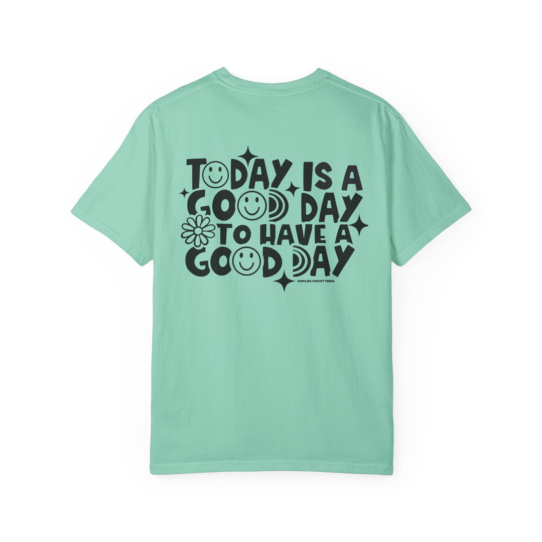A relaxed fit God Day to Have a Good Day Tee in green with black text. Made of 100% ring-spun cotton for coziness and durability, featuring double-needle stitching and no side-seams for a tubular shape.
