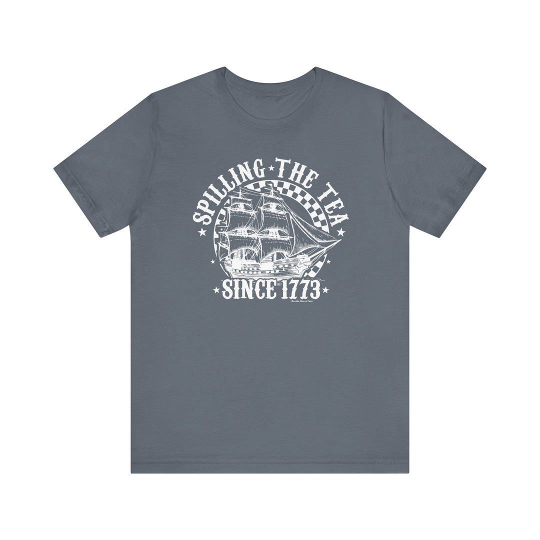 A grey tee featuring a sailboat graphic and white text, embodying the Spilling the Tea Since 1773 Tee from Worlds Worst Tees. Unisex jersey tee with ribbed knit collar, 100% cotton, retail fit.