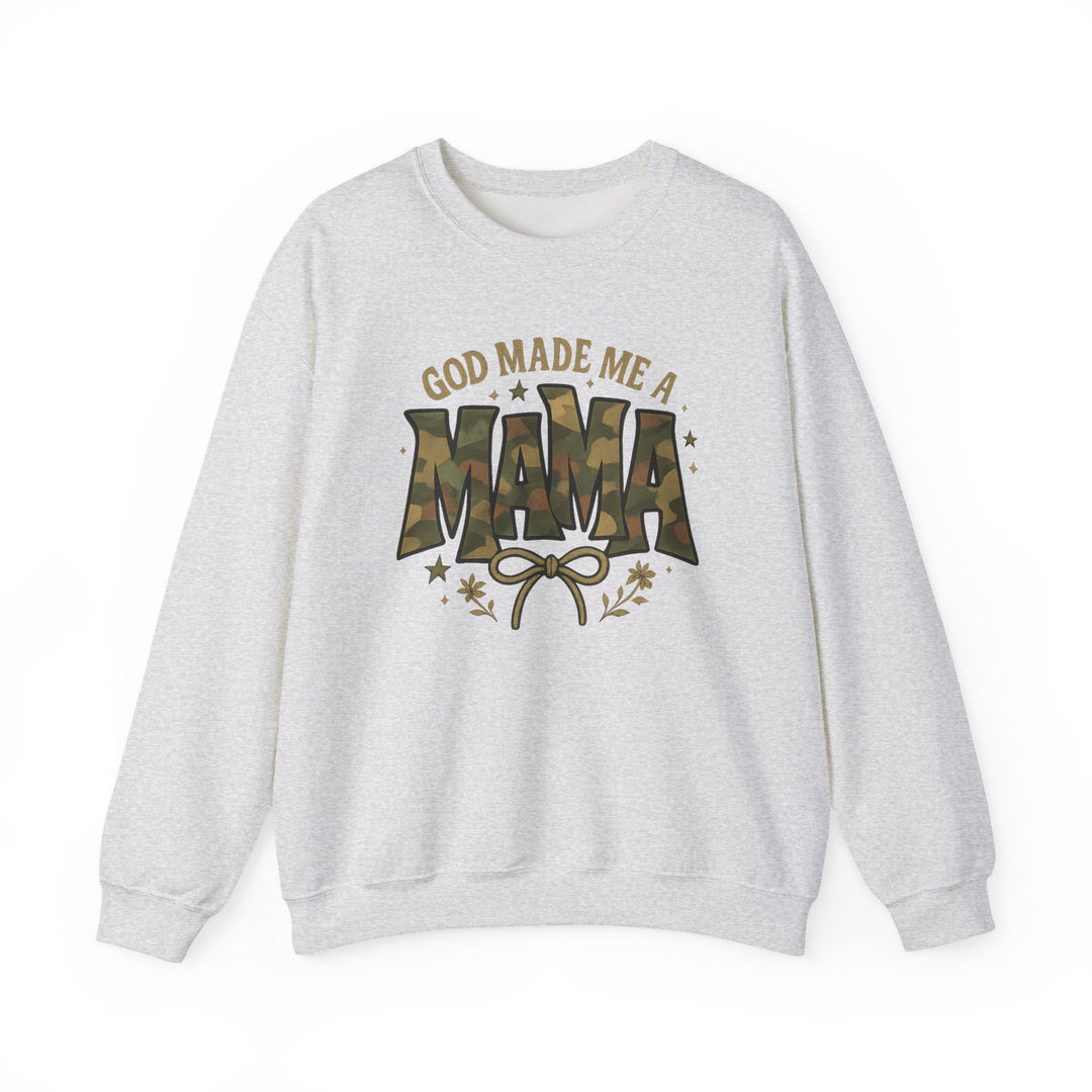 Light-heather-gray crewneck sweatshirt with GOD MADE ME A MAMA graphic, featuring camouflage MAMA and floral accents, offering comfort and durability with sustainable materials.