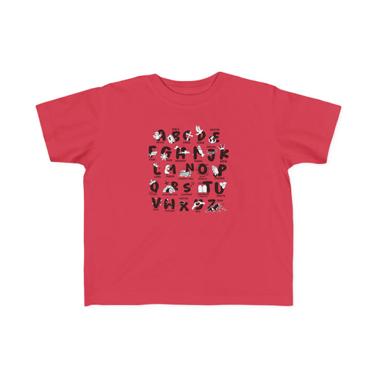 Bible Alphabet Toddler Tee: Red shirt with black and white text, ideal for sensitive skin. 100% combed ringspun cotton, light fabric, tear-away label. Sizes: 2T, 3T, 4T, 5-6T. Classic fit.