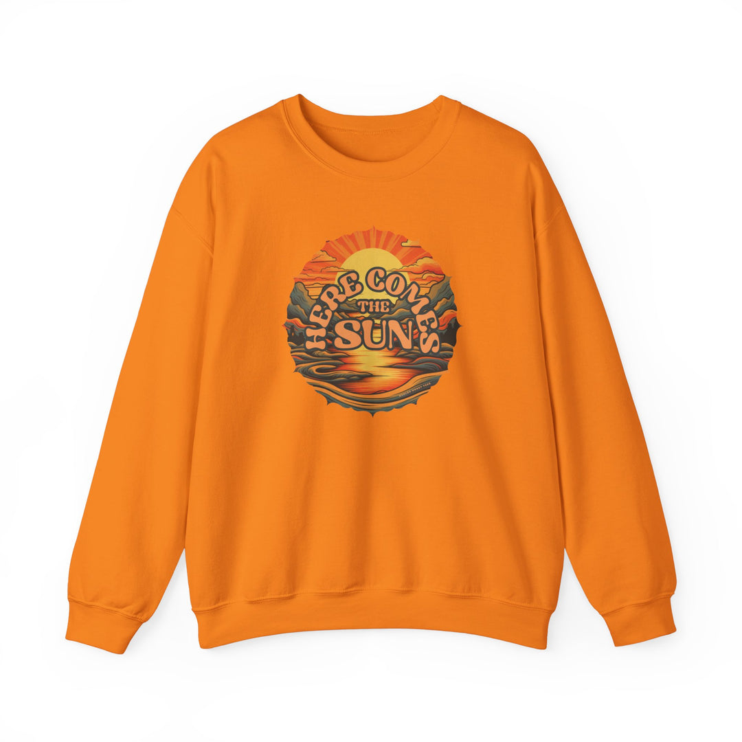 Unisex Here Comes the Sun Crew sweatshirt, orange with graphic design. Polyester-cotton blend, ribbed knit collar, no itchy side seams. Comfortable, loose fit, medium-heavy fabric. Ideal for all occasions.