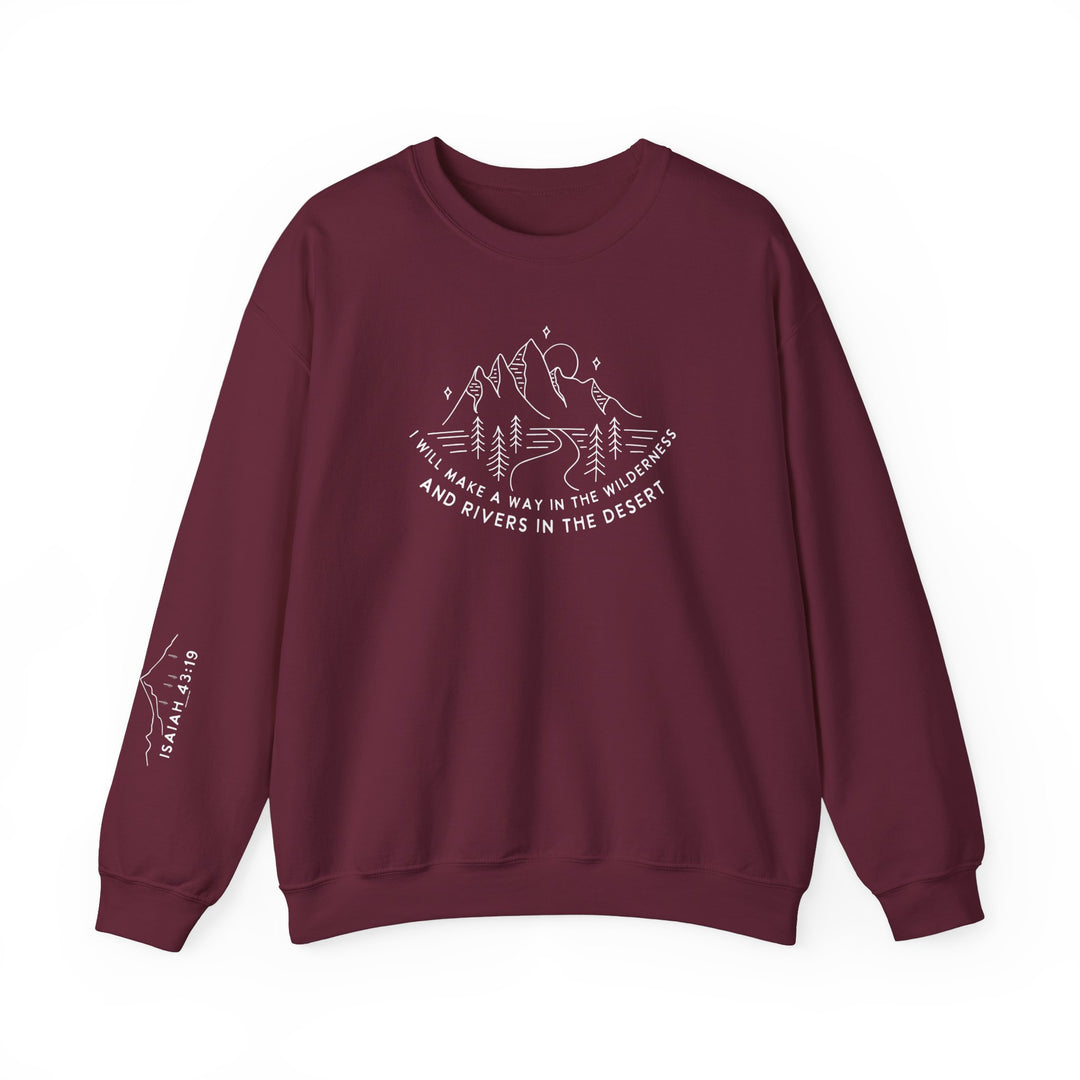 A maroon crewneck sweatshirt with white text, featuring a mountain and tree logo, ideal for comfort and style. Made from a cozy 50% cotton, 50% polyester blend, with ribbed knit collar and durable stitching.