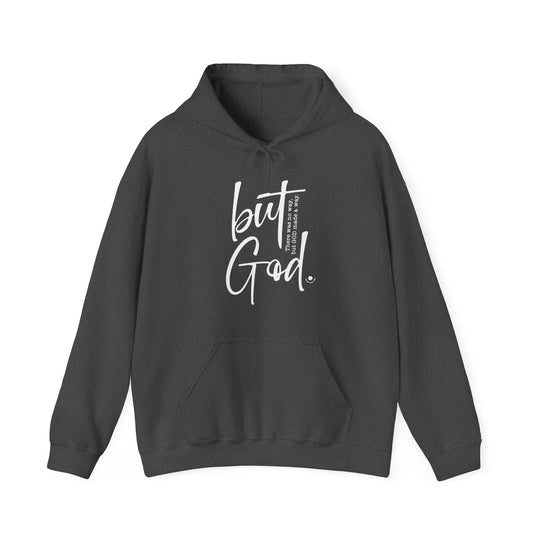 A black unisex But God Hoodie, a cozy blend of cotton and polyester with a kangaroo pocket and matching drawstring. Perfect for chilly days. Classic fit, tear-away label, true to size.