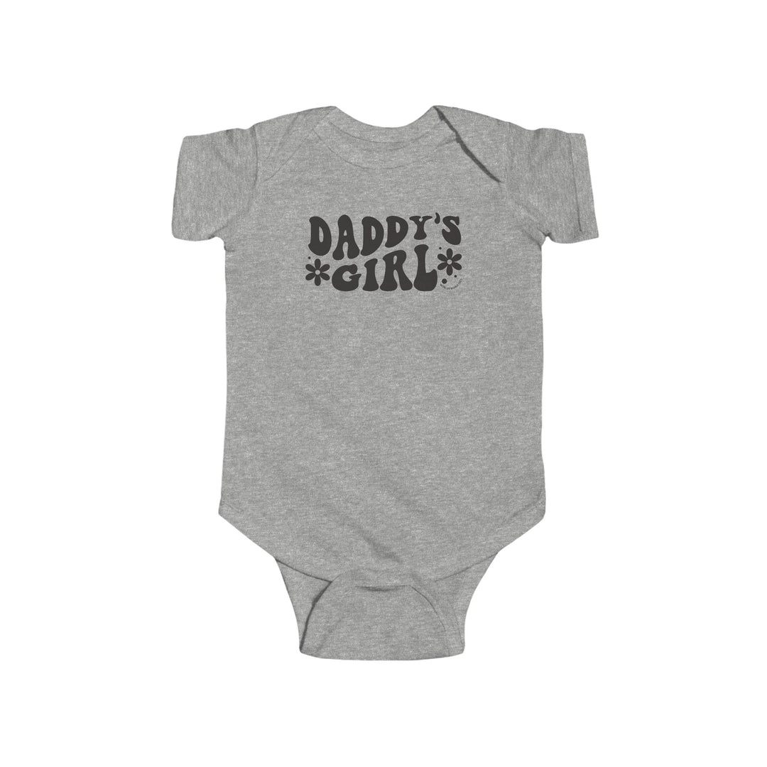 A grey baby bodysuit with black text, featuring Daddy's Girl Onesie design. Made of 100% cotton, with ribbed knitting for durability and plastic snaps for easy changing. From Worlds Worst Tees.