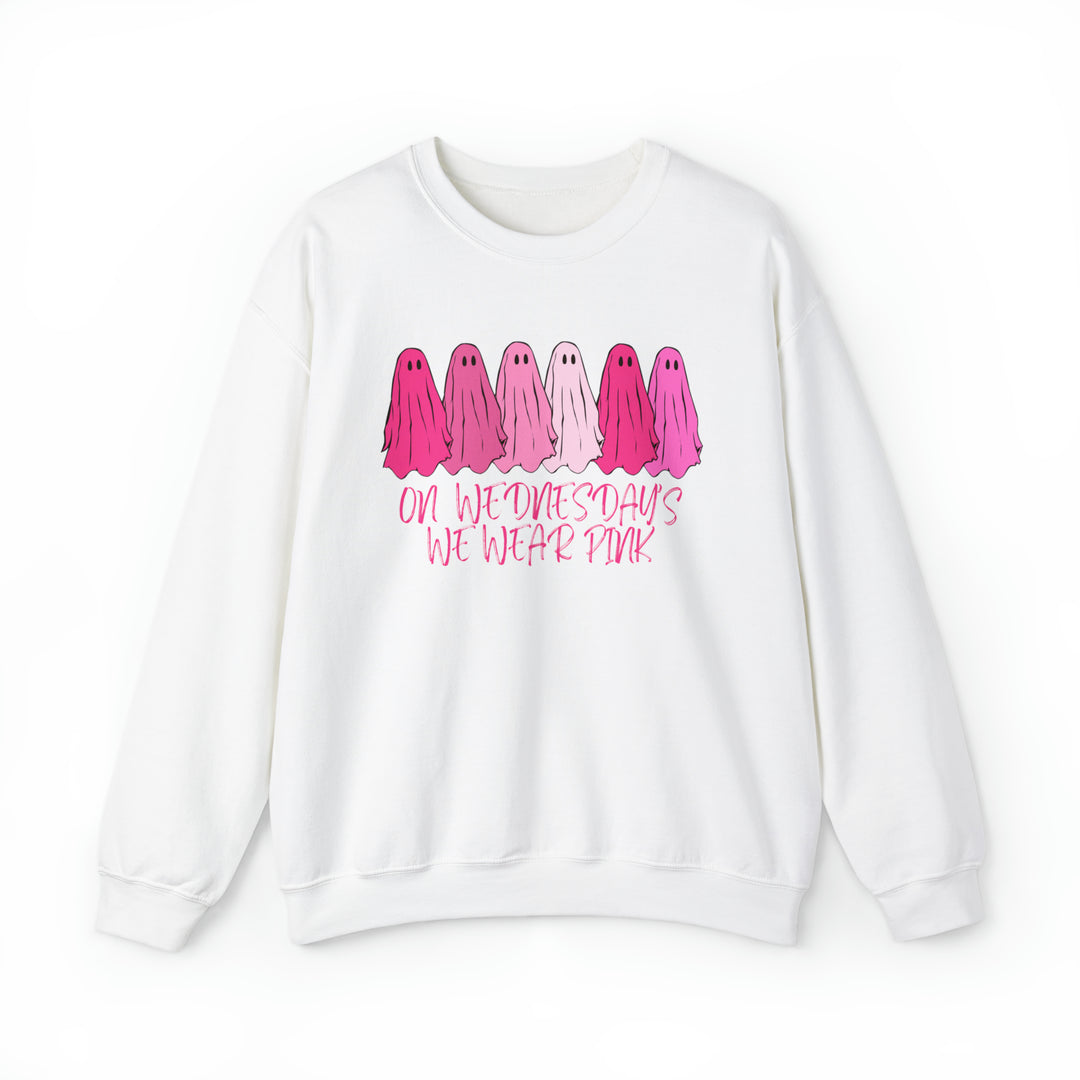 Unisex heavy blend crewneck sweatshirt featuring On Wednesday's We Wear Pink crew design. Ribbed knit collar, no itchy side seams, 50% cotton, 50% polyester, loose fit, medium-heavy fabric. Sewn-in label, true to size.