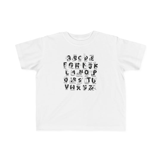 Toddler tee with black alphabet letters on white fabric. Soft, 100% combed ringspun cotton for sensitive skin. Durable print, perfect for little adventurers. Sizes: 2T, 3T, 4T, 5-6T. Classic fit, tear-away label.