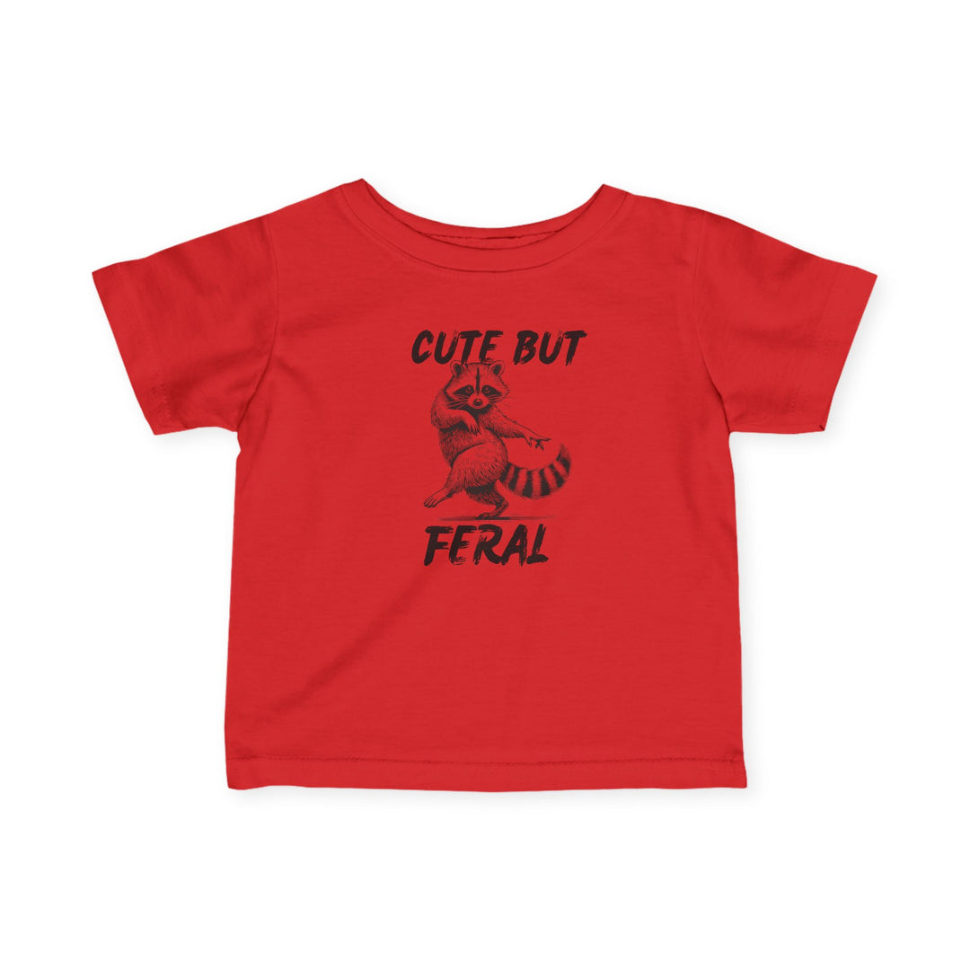 Cute but Feral Baby Tee: A bright red children's T-shirt with a raccoon illustration and slogan, emphasizing comfort and durability with soft, ring-spun cotton.