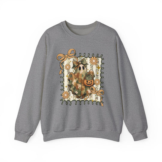 Quilted Ghost Crew: Heather-gray sweatshirt with camo ghost holding a jack-o’-lantern, surrounded by autumnal leafy border with orange bows and daisies. Cozy, durable fabric.