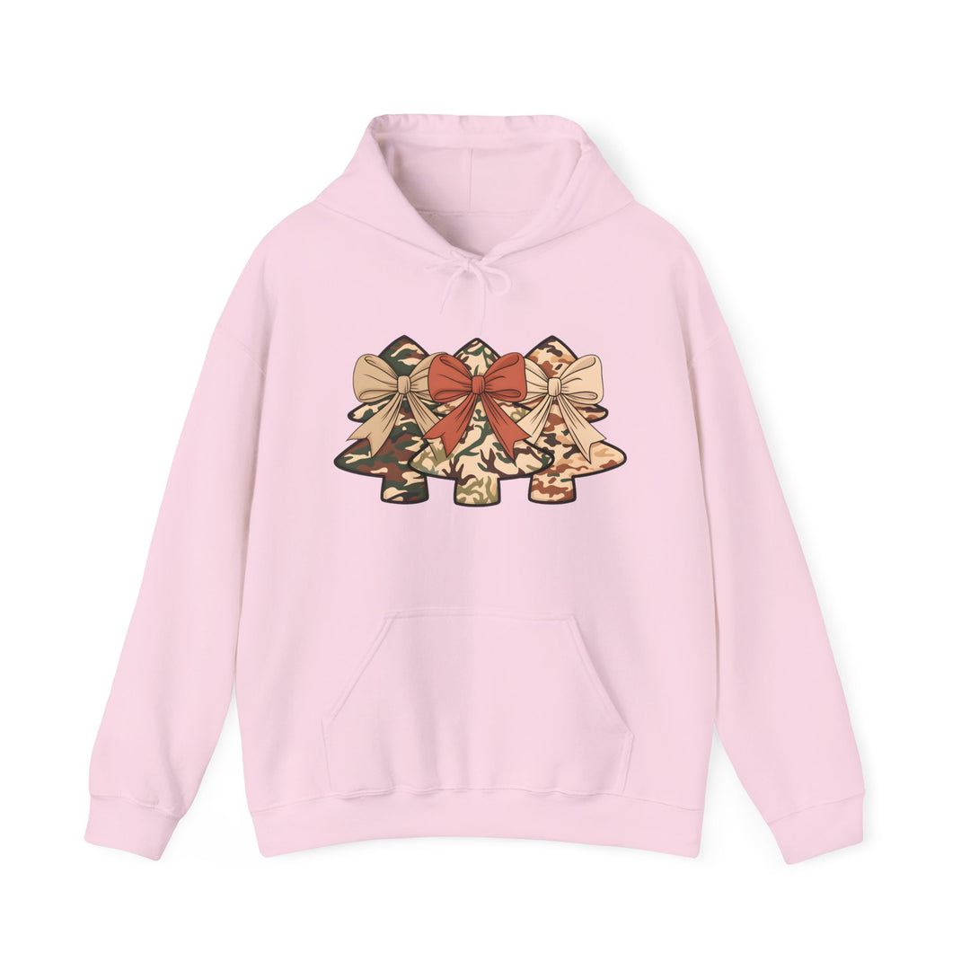 Camo Christmas Tree Hoodie featuring three camo-patterned Christmas trees with bows, light pink pullover design, kangaroo pocket, and drawstring hood. Ideal for casual, festive wear.