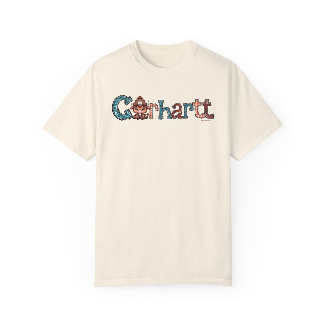 A relaxed fit Cowhartt Tee, a white t-shirt with a cartoon cow logo, crafted from 100% ring-spun cotton for durability and comfort. Ideal for daily wear with double-needle stitching and a seamless design.