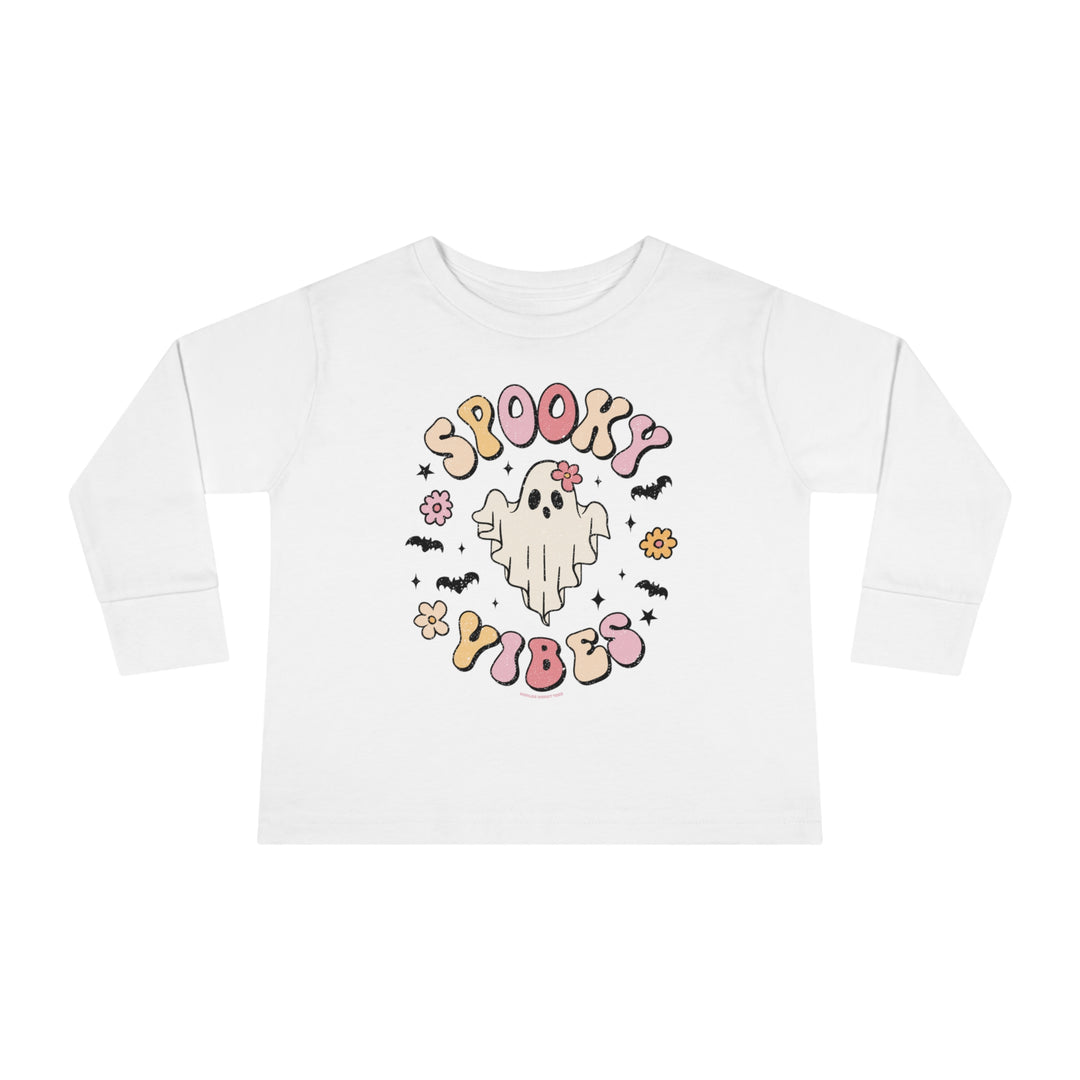 A spooky-themed toddler long sleeve tee featuring a white shirt with a ghost and bats design. Made of durable 100% combed ringspun cotton for comfort and style. From 'Worlds Worst Tees'.