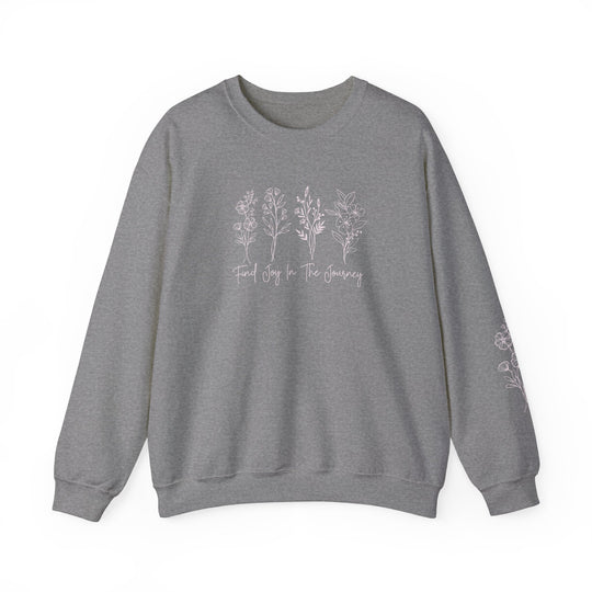 A grey crewneck sweatshirt featuring Find Joy in the Journey Crew text. Unisex, heavy blend fabric with ribbed knit collar, no itchy seams. Ideal comfort for all.