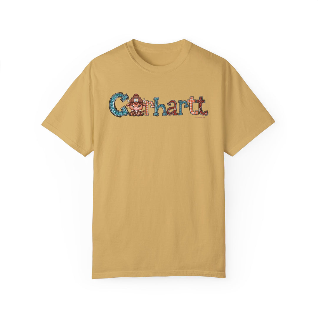A tan Cowhartt Tee, 100% ring-spun cotton, garment-dyed for coziness. Relaxed fit, double-needle stitching for durability, no side-seams for shape retention. Medium weight, ideal for daily wear.