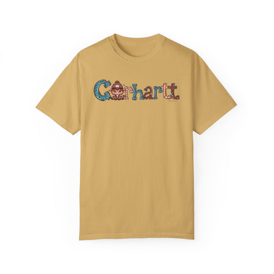 A tan Cowhartt Tee, 100% ring-spun cotton, garment-dyed for coziness. Relaxed fit, double-needle stitching for durability, no side-seams for shape retention. Medium weight, ideal for daily wear.