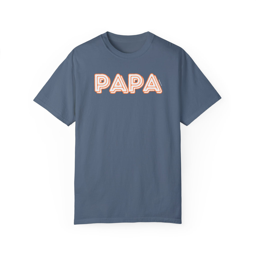 Relaxed fit Papa Tee in blue with white text. 100% ring-spun cotton, garment-dyed for coziness. Double-needle stitching for durability, no side-seams for shape retention. Medium weight, versatile daily wear.