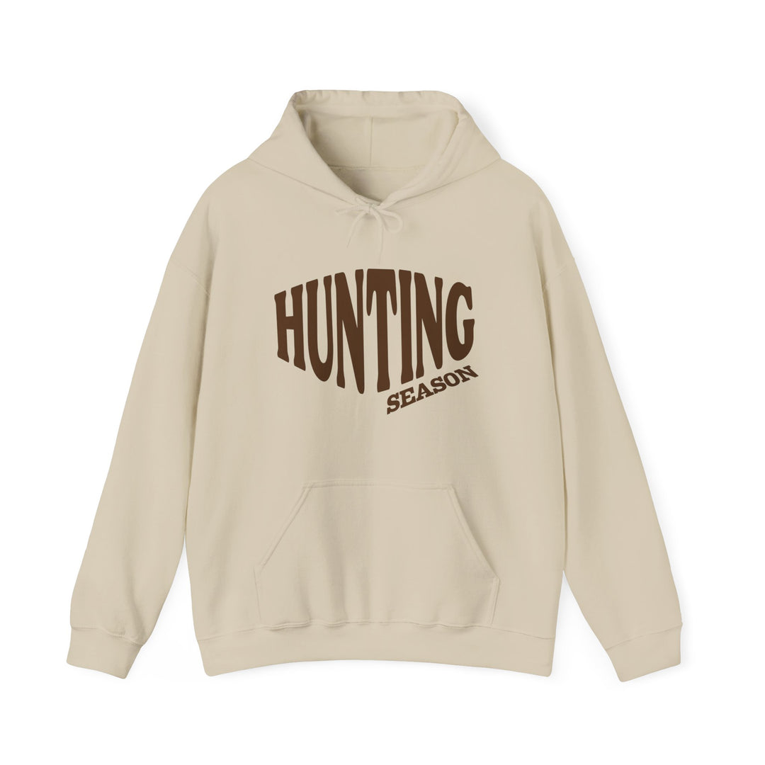 Hunting Season Hoodie: Light-beige pullover with HUNTING SEASON in brown, front kangaroo pocket, and drawstring hood. Cozy blend for warmth and style.